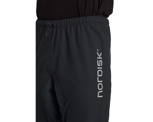 Horizon-1137-unisex-3-layer-stretchable-pants-Nordisk-black-blue-zip-male-model-05.jpg Horizon